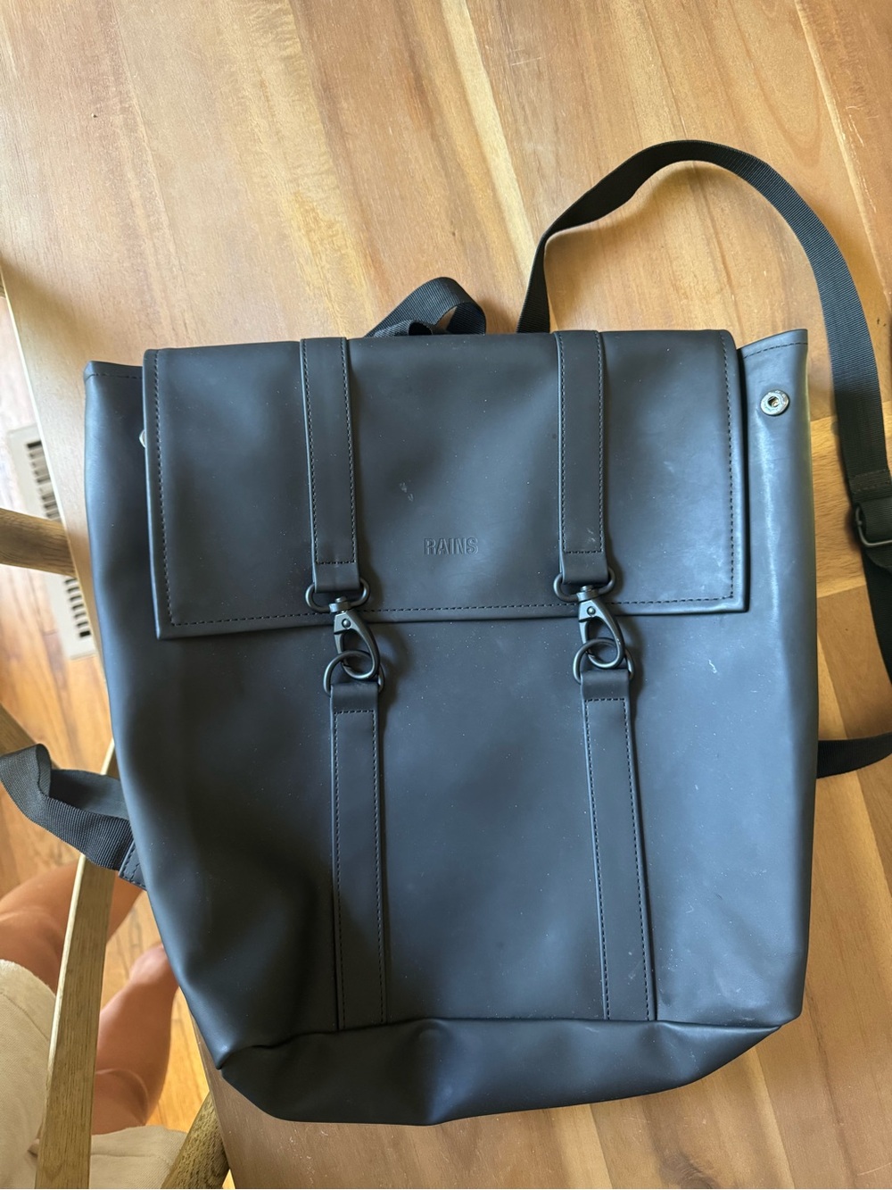 Rains Black Roll-Top Backpack with Front Hook Straps